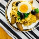 Peruvian Aji de Gallina - Shreaded chicken with mild pepper sauce, olives, and egg