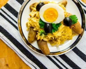 Peruvian Aji de Gallina - Shreaded chicken with mild pepper sauce, olives, and egg